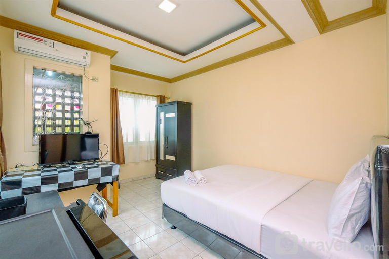Bedroom 4, Minimalist and Homey Studio Apartment at Margonda Residence 1 By Travelio, Depok