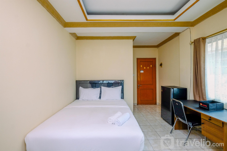 Bedroom 3, Minimalist and Homey Studio Apartment at Margonda Residence 1 By Travelio, Depok
