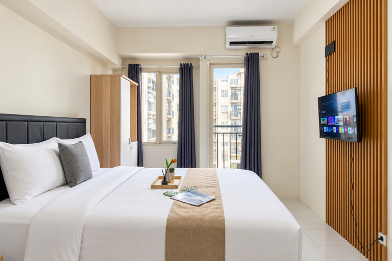 Bedroom 4, Homey and Minimalist Studio at Apartment Podomoro Golf View By Travelio, Bogor