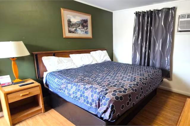 Bedroom 3, Economy Inn Cadillac MI by Hotel O, Wexford