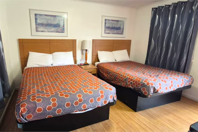 Bedroom 4, Economy Inn Cadillac MI by Hotel O, Wexford