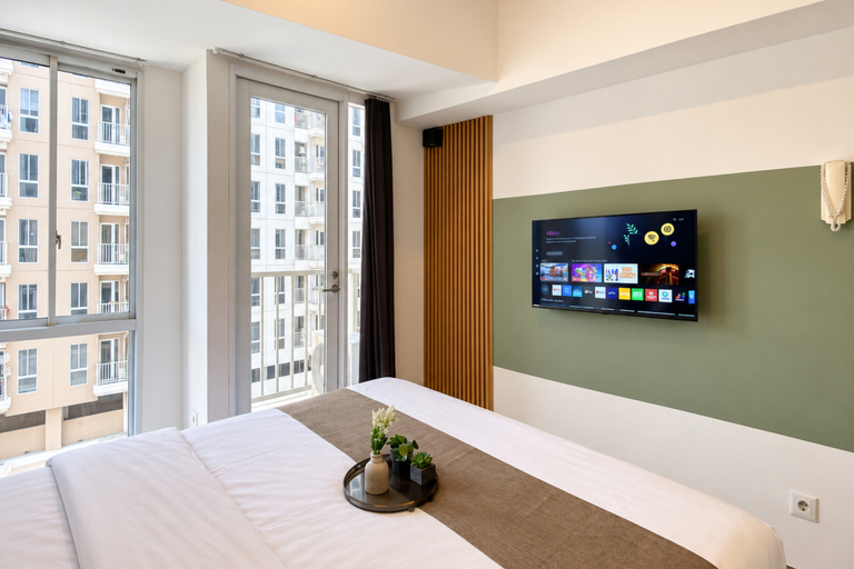 Bedroom 5, Everyday Comfort Studio at Apartment Tokyo Riverside PIK 2 By Travelio, Tangerang