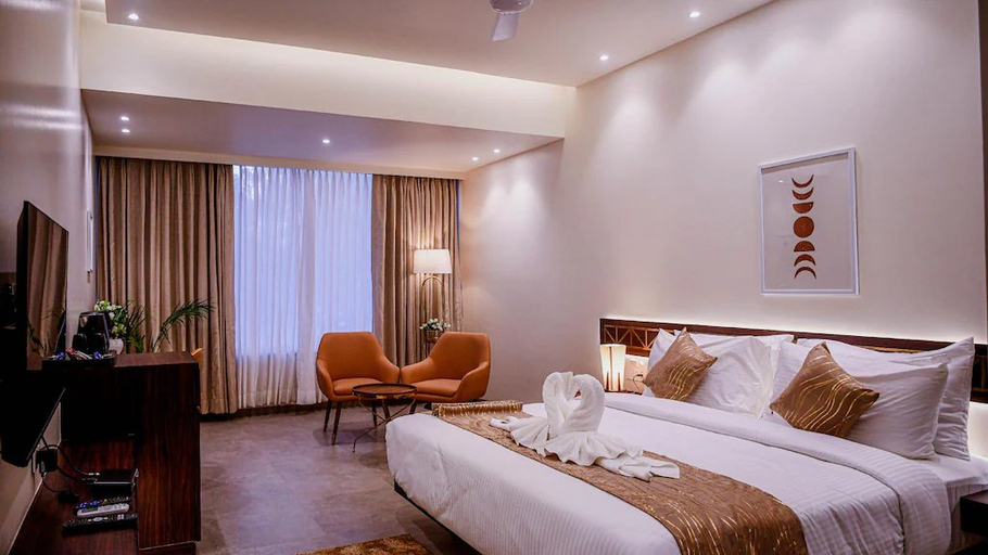 Bedroom 4, The Hotel Ambience, Pune