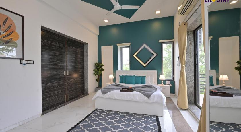 Bedroom 5, EKO STAY (Gold) - BLUE PEBBLE VILLA, Pune