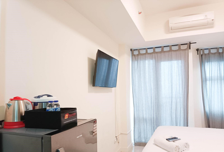 Bedroom 1, Cozy & High Studio Vida View Makassar By Travelio, Makassar