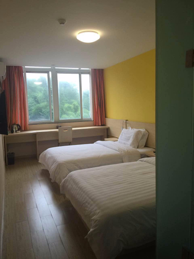 Bedroom 5, 7 Days Inn Ziyang Lezhi Yingbin Avenue, Ziyang