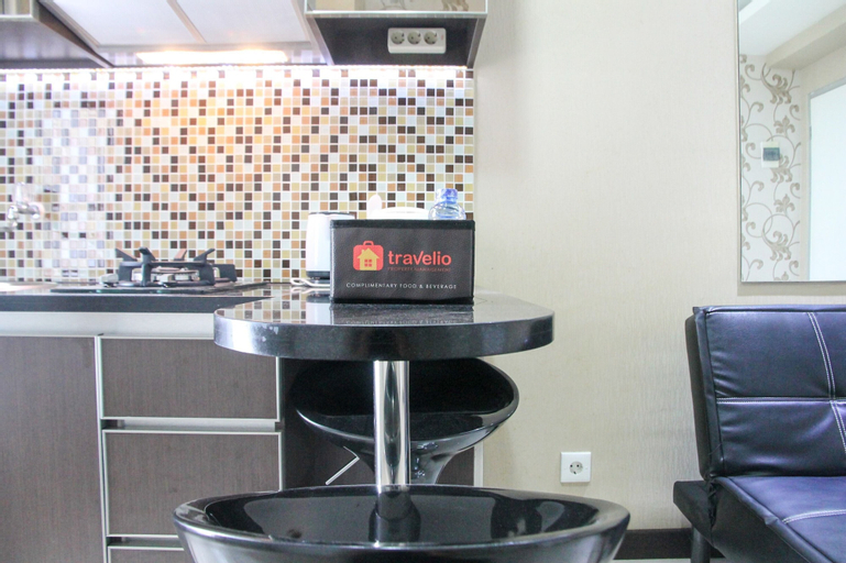 Clean and Cozy 2BR at Green Bay Apartment By Travelio, North Jakarta