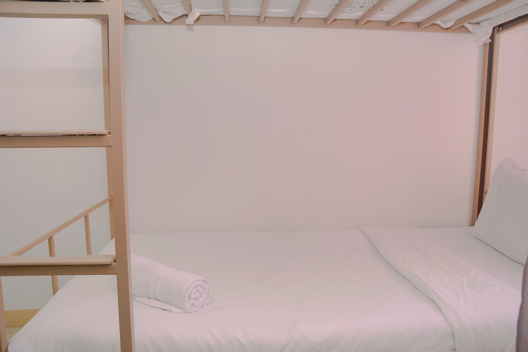 Green Bay Pluit Studio Apartment with 2 Single Beds By Travelio, North Jakarta