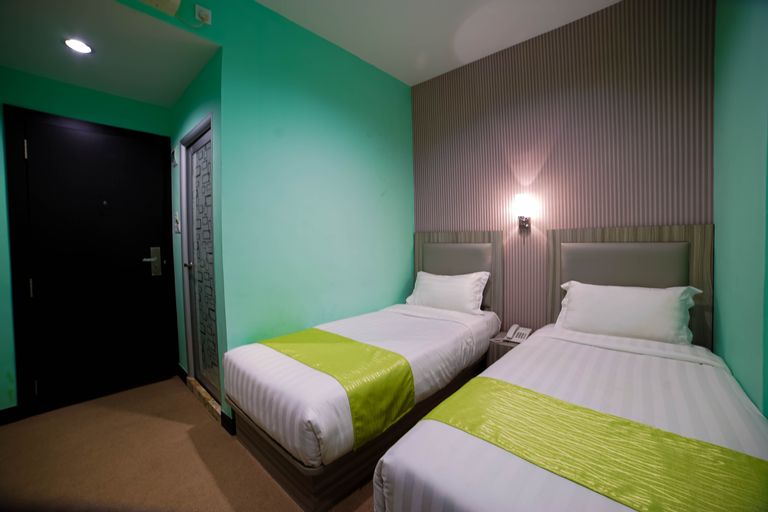 Greenland Hotel Batam - Tap to explore photos