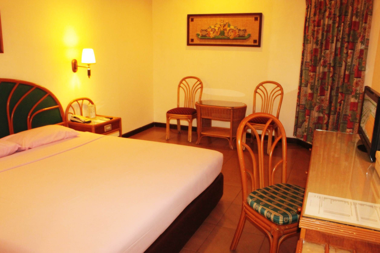 Losari Beach Inn - Tap to explore photos