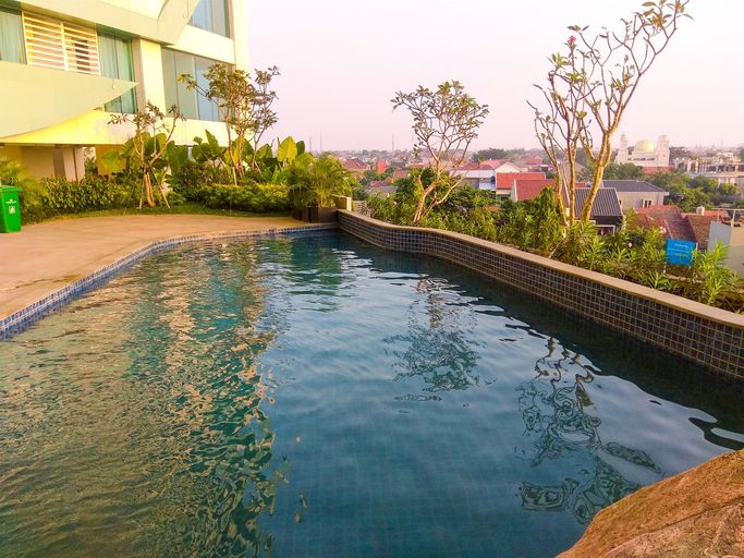 Exterior & Views 1, Modern 2BR Grand Kamala Lagoon Apartment By Travelio, Bekasi