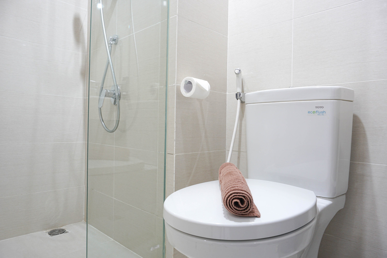 Simple and Minimalist 3BR Apartment at Puri Mansion By Travelio, West Jakarta