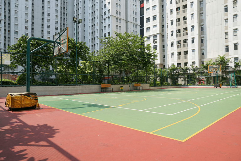 Clean and Cozy 2BR at Green Bay Apartment By Travelio, North Jakarta