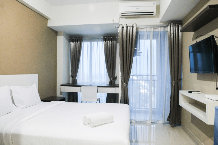Bedroom 3, Nice Furnished Studio Apartment @ Grand Dhika City By Travelio, Bekasi