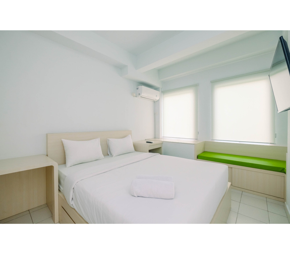 Comfy and Minimalist 1BR Patraland Urbano Apartment near Bekasi Station By Travelio, Bekasi