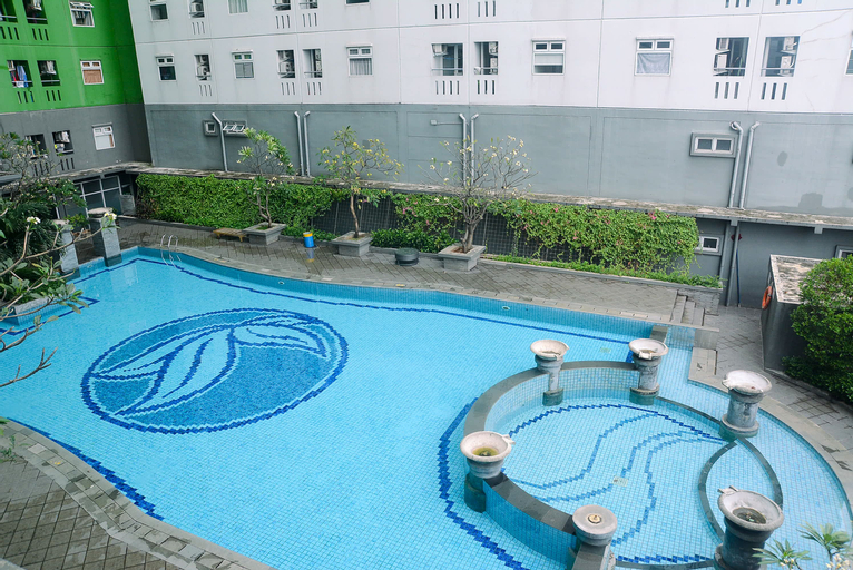 Tidy 2BR with Modern Design Green Pramuka City Apartment By Travelio, Central Jakarta