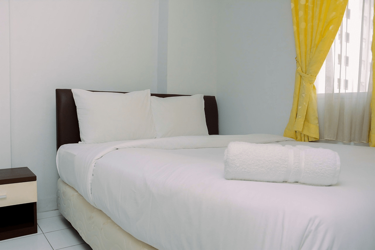 Compact and Cozy 2BR Kalibata City Apartment By Travelio, Jakarta Selatan