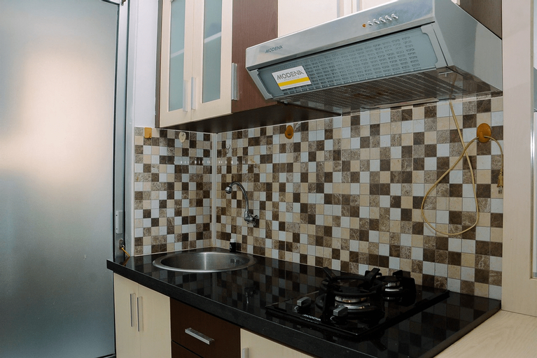 Compact and Cozy 2BR Kalibata City Apartment By Travelio, Jakarta Selatan