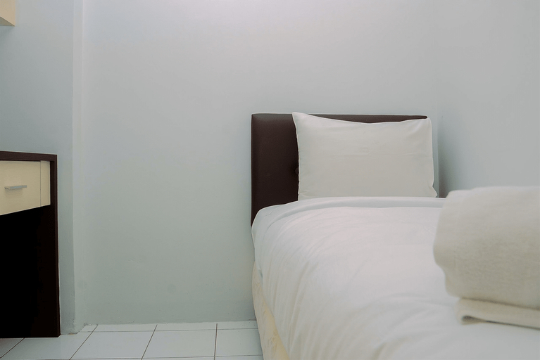 Compact and Cozy 2BR Kalibata City Apartment By Travelio, Jakarta Selatan