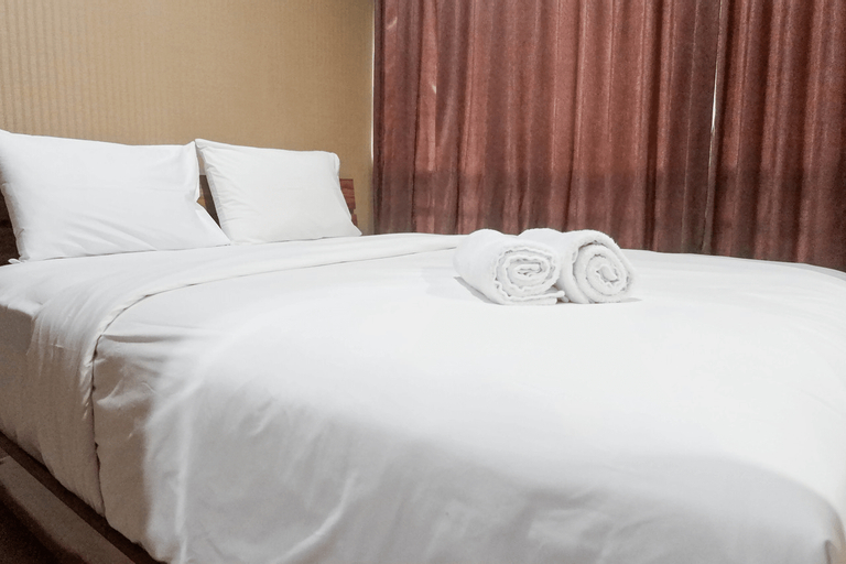 Minimalist 2BR Apartment at Tamansari Papilio By Travelio, Surabaya