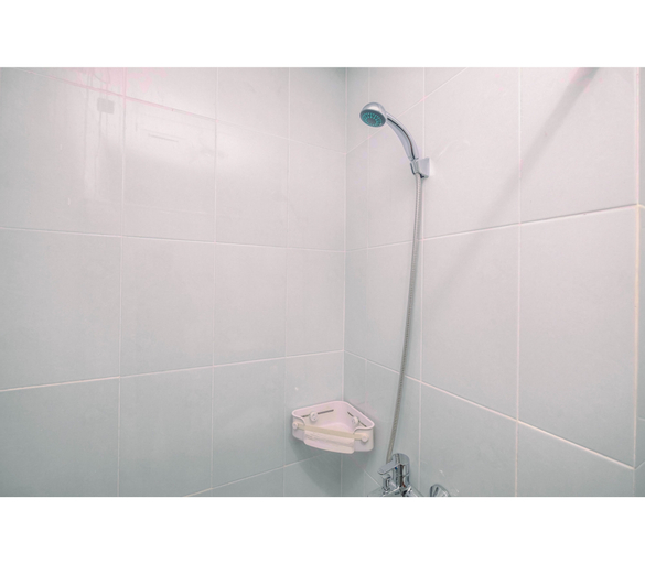 Comfy and Minimalist 1BR Patraland Urbano Apartment near Bekasi Station By Travelio, Bekasi