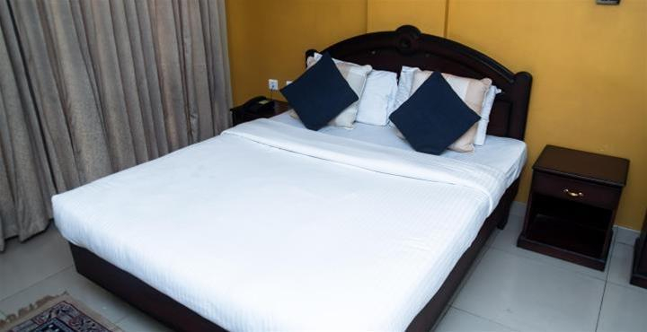 Bedroom 1, Hotel Mint Flower, Wayanad