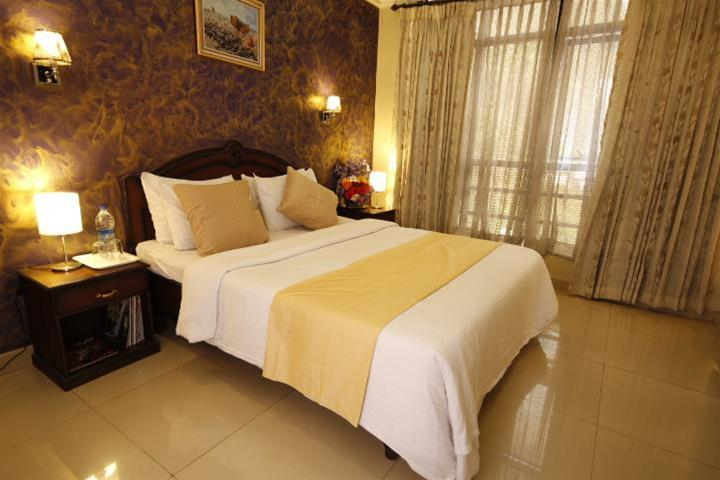 Bedroom 4, Hotel Mint Flower, Wayanad