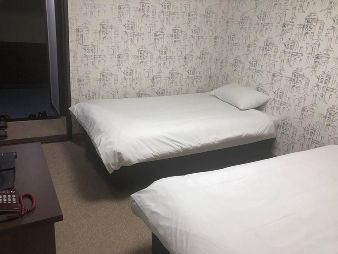 Bedroom 4, New Manhattan Tourist Hotel, Jeju