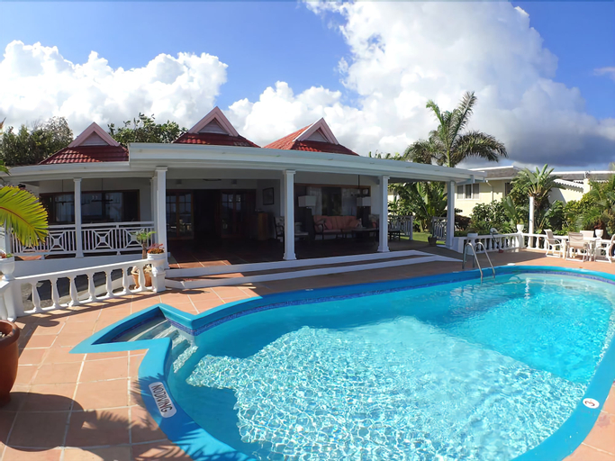 Tumac Villa, 4BR by Jamaican Treasures,