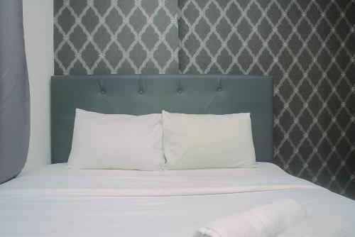 Bassura City 2BR Apartment with Minimalist Design near Shopping Mall By Travelio, East Jakarta