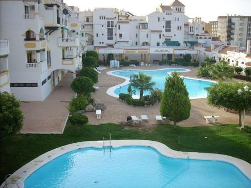 Unknown 3, Apartment with one bedroom in Roquetas de Mar with shared pool furnished garden and WiFi 50 m from t, Almería