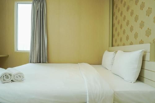 Strategic 1BR The Boulevard Apartment with Luxurious Design By Travelio, Central Jakarta