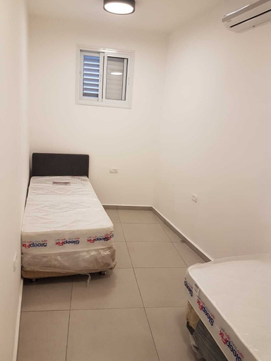 Bedroom 2, AirTLV Hatikva Apartments