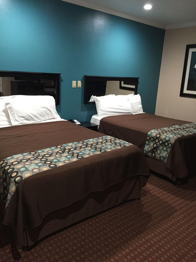 Bedroom 3, Scottish Inn & Suites Houston, Houston