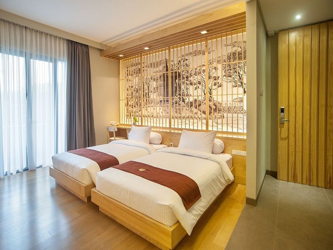 Tama Boutique Hotel - Bedroom