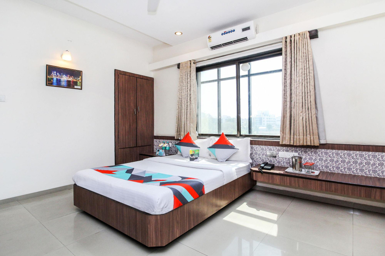 Bedroom 1, FabExpress Sai Grand Castle Inn, Ahmadnagar