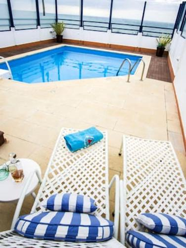 House with 4 bedrooms in Ericeira with wonderful sea view private pool furnished terrace 500 m from , Mafra