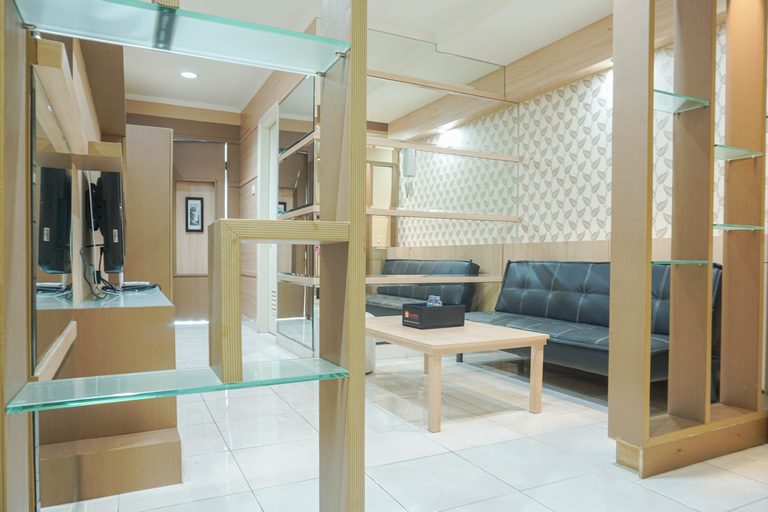 Strategic 1BR The Boulevard Apartment with Luxurious Design By Travelio, Central Jakarta
