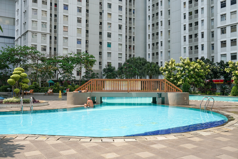 Sport & Beauty, Beautiful 2BR with Direct Access to Pool Green Bay Apartment By Travelio, Jakarta Utara