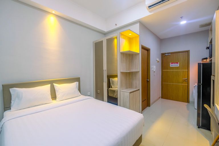 Bedroom 1, Homey and Warm Studio Apartment Oasis Cikarang By Travelio, Cikarang