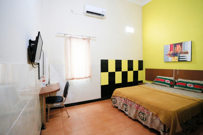 Olive Guest House Bumi Mas Raya - Tap to explore photos