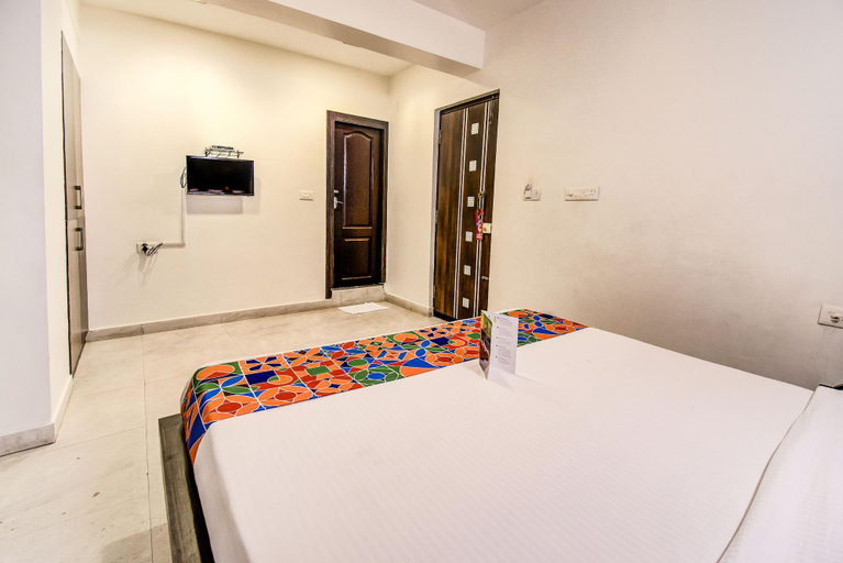 Bedroom 5, FabHotel Capital Residency Brigade Rd, Bangalore