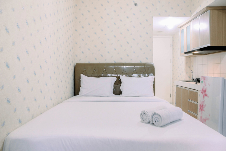 Bedroom 5, Modern Furnished Studio at Springlake Summarecon Bekasi Apartment By Travelio, Bekasi