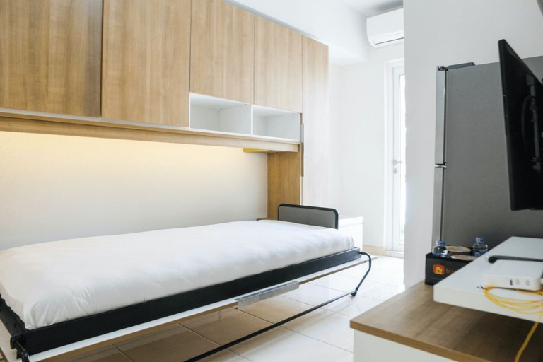 Bedroom 2, 2BR with Sofa Bed at Springlake Summarecon Apartment By Travelio, Bekasi