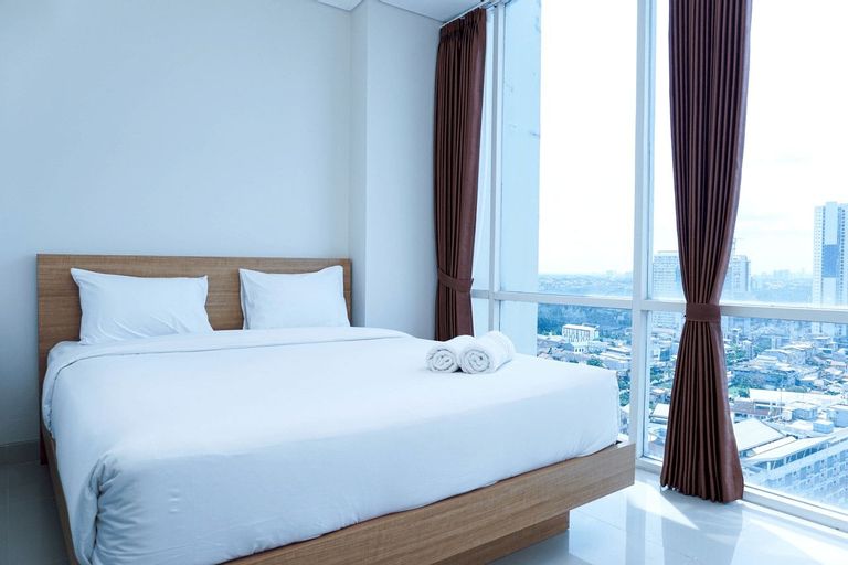 Bedroom 1, Homey and Modern 2BR Apartment at Atlanta Residence By Travelio, Depok