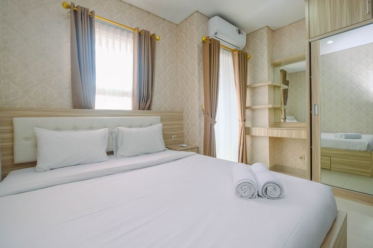 Bedroom 1, Cozy and Elegant 1BR @ Atlanta Residences By Travelio, Depok