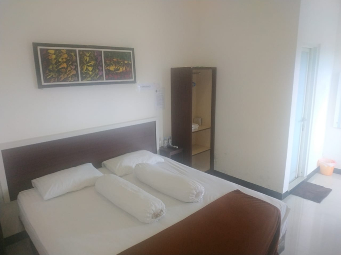 Bedroom 3, Fidelia Homestay Palu Mitra RedDoorz, Palu