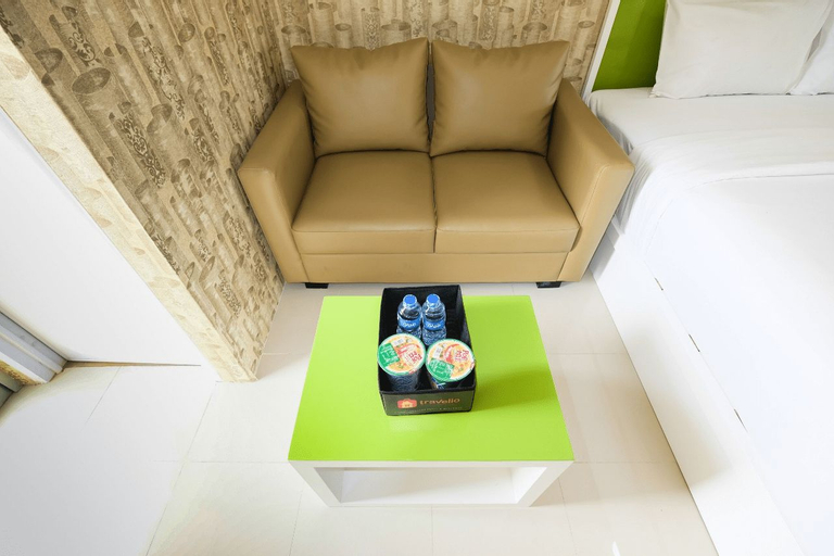Bedroom 3, Modern and Minimalist Studio Bassura City Apartment By Travelio, East Jakarta