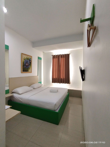De Whitte Hotel Pekanbaru - Tap to explore photos