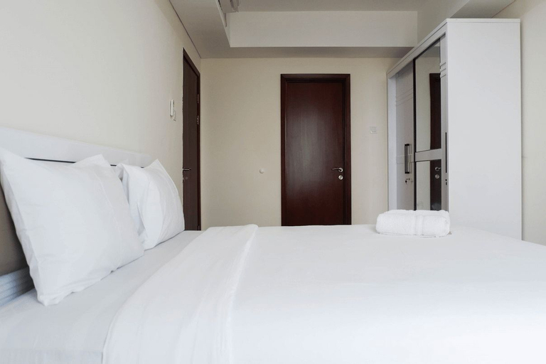Deluxe 2BR Apartment at Grand Sungkono Lagoon By Travelio, Surabaya